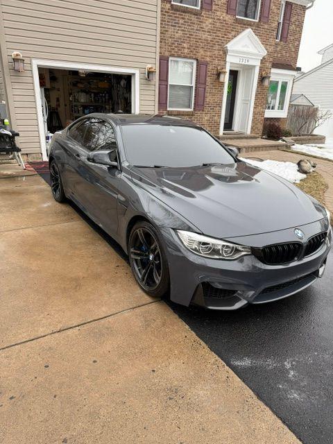 Detailed gray BMW M4, exterior shine