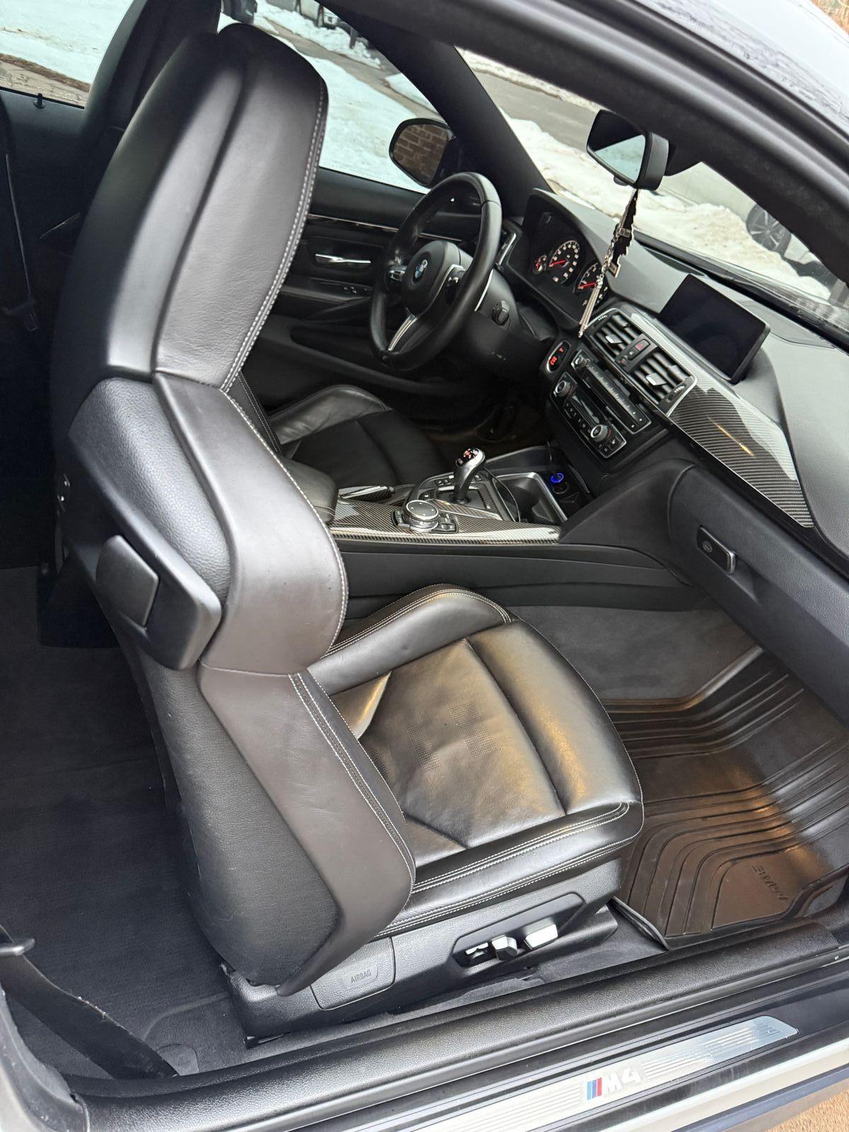 BMW M4 front passenger seat and console detailed